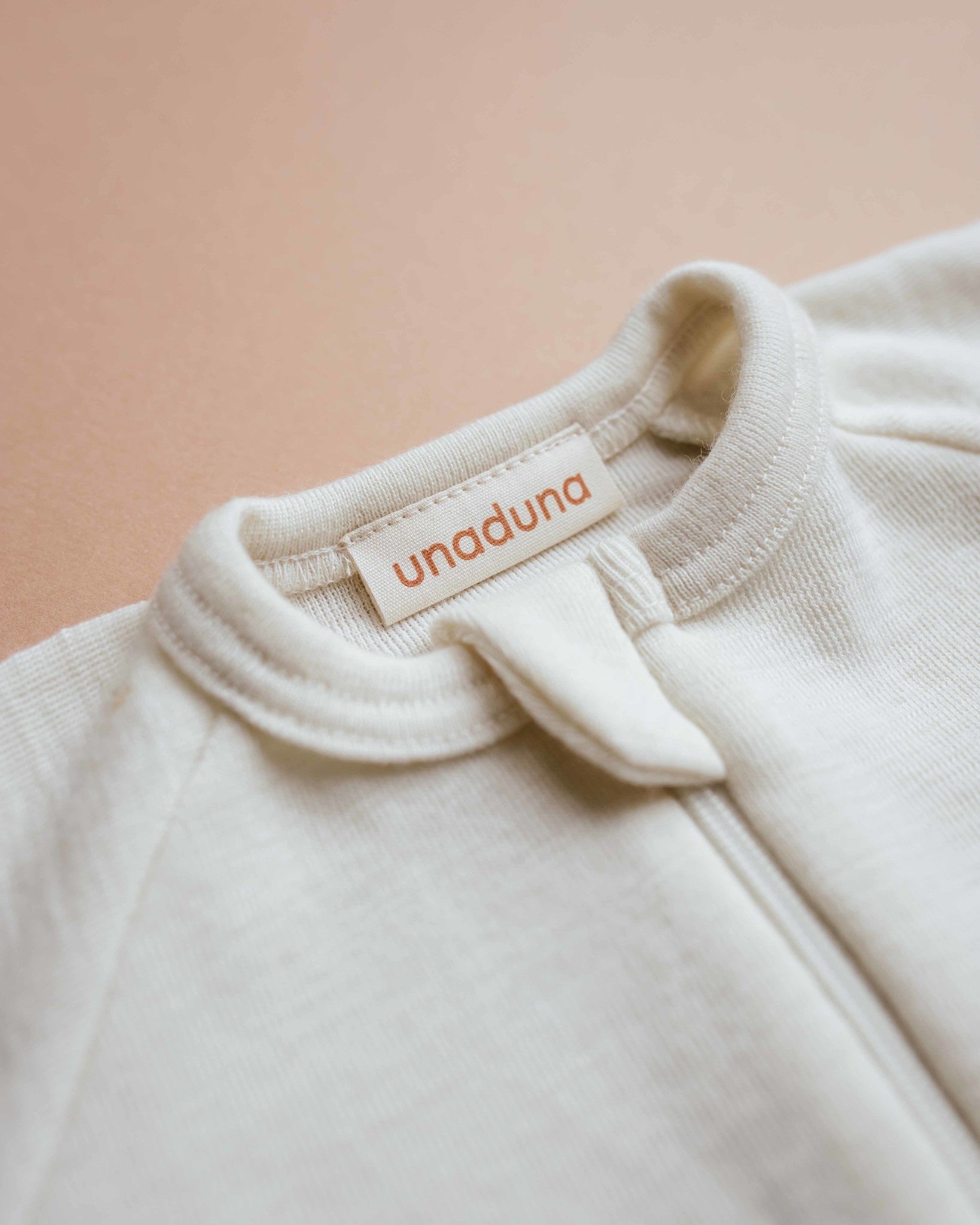 unaduna-slaapzak-wol-naturel-baby